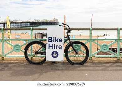 Bike Hire Sign On A Battered And Peeling Old Bike