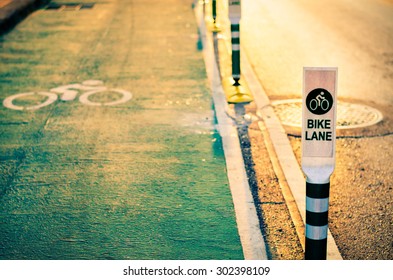 Bike lane in Bangkok city, Thailand. (Selective focus for shallow depth of field effect with golden warm light filter)