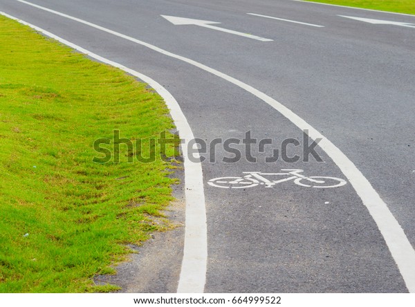 bike\
lane, bicycle lane on asphalt texture\
background