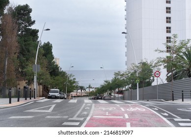 Bike Lane On A Downhill Slope On An Avenue In Benidorm, Spain, Leading To The Beach.