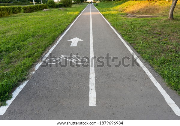 bike lane sign on the
asphalt. Bike path