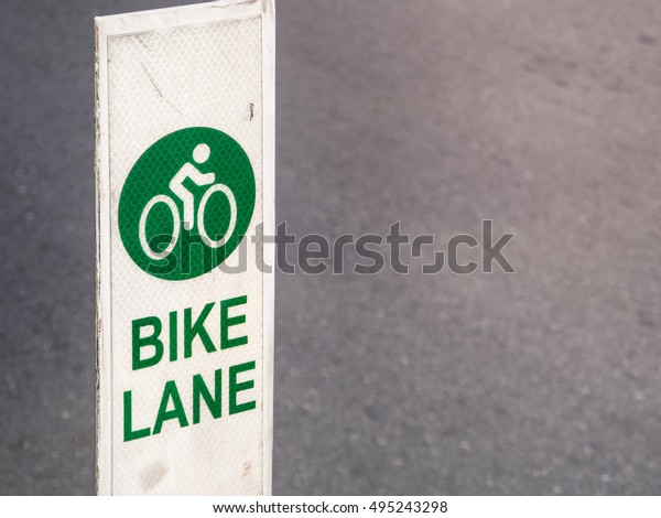 Bike lane sign traffic for\
bicycles in the city, With place your text (bicycle, sign,\
traffic)