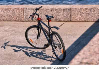 The Bike Is On The Embankment, There Are No People.