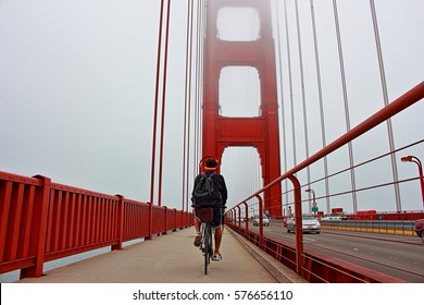 Bike On Golden Gate Bridge, San Francisco.
Backpackers On The Road. 