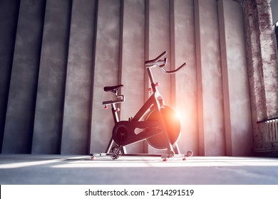 Bike On Gray Concrete Wall In Gym