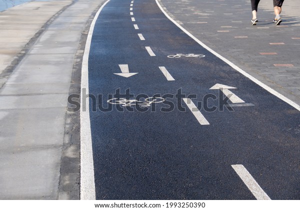 bike path,\
bicycle lane, by the walking\
path