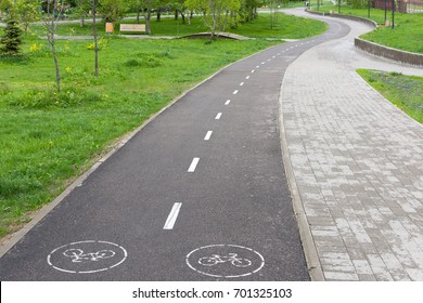 Bike Path In The Park. A Bicycle Road In A Cozy Park.