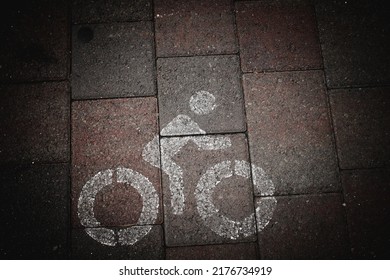 Bike Path Sign On The Sidewalk