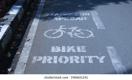 Bike Priority Lane Sign On Asphalt Road In Bandung