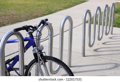 A Bike At Bike Rack In Campus