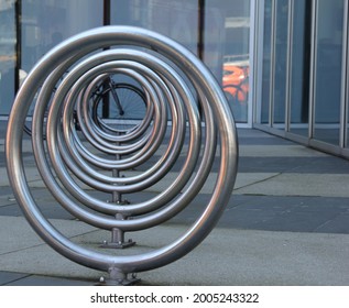 a bike rack makes circular patterns in Vancouver BC