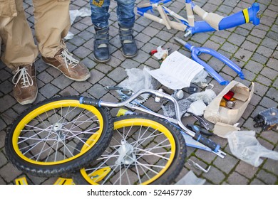 Bike Repair, Best Friends, Boy And Man, Father And Son Assembling Together A New Bicycle To Learn To Ride