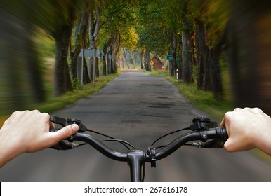 Bike Riding On A Dirt Road. The View From The Driver's Side. First Person View.