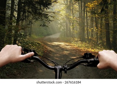 Bike Riding On A Dirt Road. The View From The Driver's Side. First Person View.