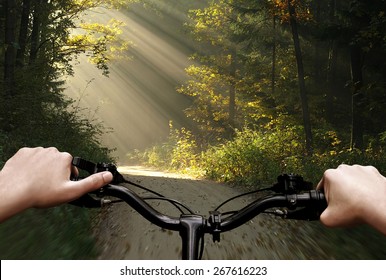 Bike Riding On A Dirt Road. The View From The Driver's Side. First Person View.