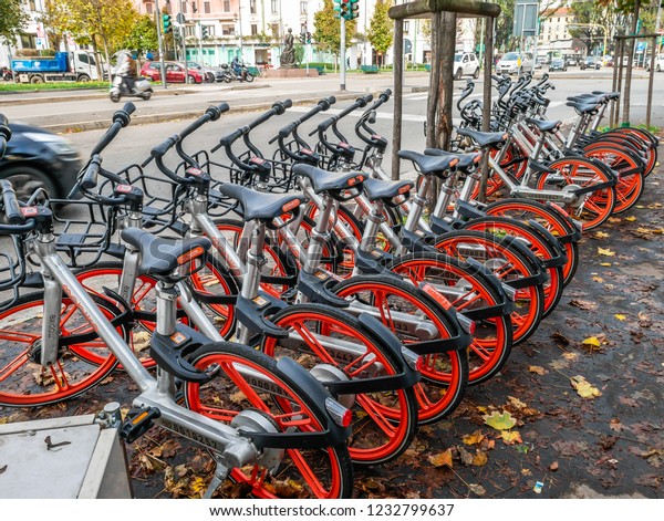 Bike Sharing Bikes parked in the Street of\
Milan,Italy-November 2018