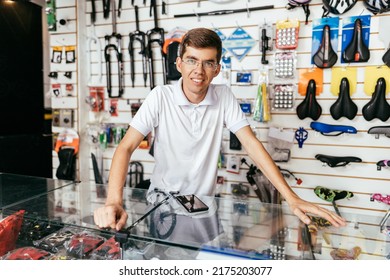 Bike Shop Owner Working In His Shop. Small Business And Entrepreneurship Concept