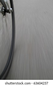 Bike Wheels In Motion On Street