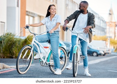 Bike, young couple and city street cycling in summer for eco friendly carbon footprint, love date and relax. Happy man, smile woman and diversity friends retro bicycle for sustainable urban adventure - Powered by Shutterstock