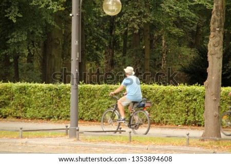 Similar – Image, Stock Photo TWO-WHEELER Human being