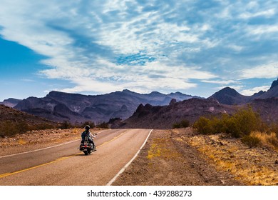 Biker driving on the Highway on legendary Route 66 to Oatman, Arizona.
