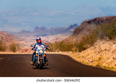 Biker Driving On The Highway On Legendary Route 66 To Oatman, Arizona, USA