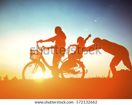 Biker family silhouette father and daughter