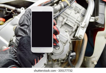 biker man calling a mechanic with the smart phone - Powered by Shutterstock