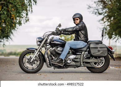 Biker Man Sitting On His Motorcycle