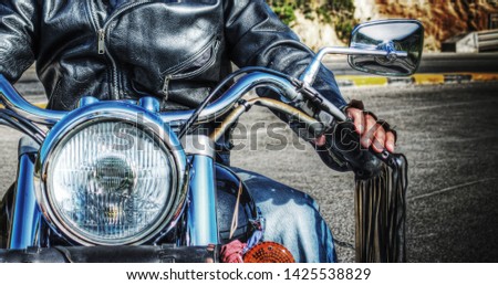 Similar – Senior man repairing damaged motorcycle engine