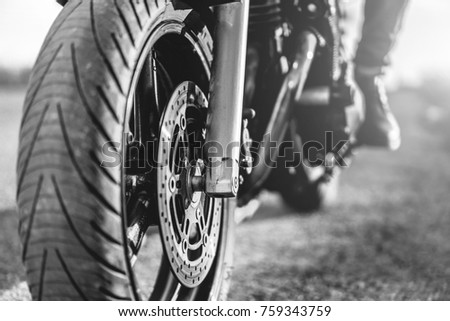 Similar – Image, Stock Photo Wheel and exhaust pipe of motorcycle on road