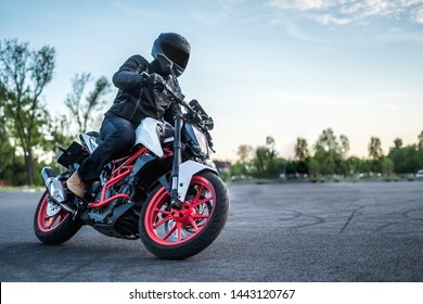 Biker Rides Motorcycle, Turns, Bright Colors Motorcycle, Sports Fast Motorcycle