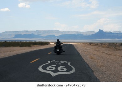 biker riding along legendary route 66