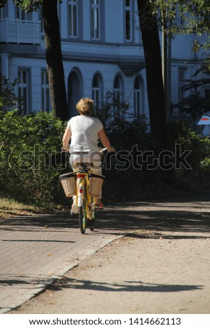 Image, Stock Photo TWO-WHEELER Human being