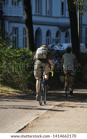 Similar – Image, Stock Photo TWO-WHEELER Human being