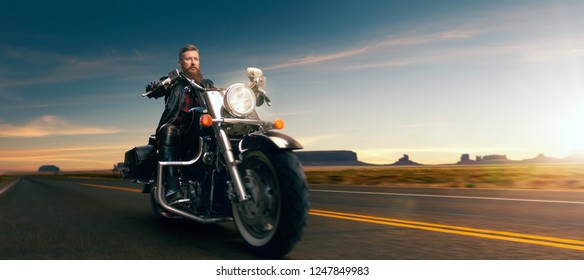 Biker Riding On Classical Chopper, Sunset