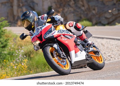 biker riding on his motorbike. Photograph captured on July 4, 2021 in the port of Navalmoral, province of Avila, Spain