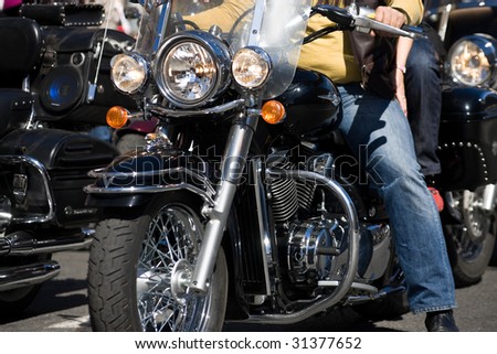 Similar – Senior man repairing damaged motorcycle engine