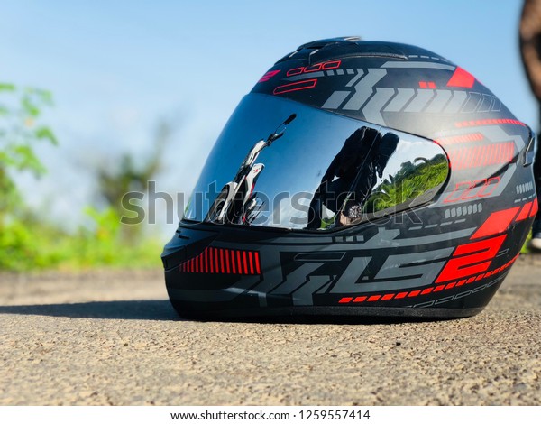 Biker\'s Helmet on\
road