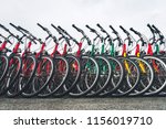 Bikes standing in a row on the city street