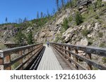 Biking over Myra Canyon trestle bridge