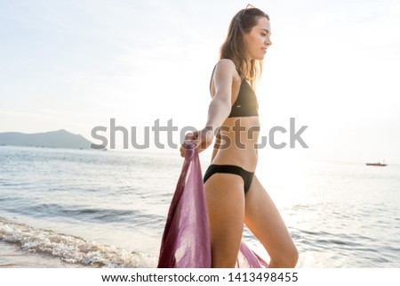 bikini girl on the beach in summer