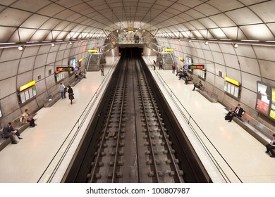 BILBAO - APRIL 05: Top View Of Portugalete Subway Station (Bilbao Metro). Some People Are Waiting For The Train On April 05, 2011 In Bilbao, Spain. Built Since 1988 By Norman Foster