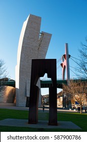 Bilbao, Basque Country, 25/01/2017: The Sculpture Of Ramon Rubial Cavia (1906-1999), President Of Spanish Socialist Workers Party (Psoe) Under  La Salve Bridge, The Red Arch Bridge Built In The 1970s