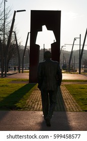 Bilbao, Basque Country, 25/01/2017: The Sculpture Of Ramon Rubial Cavia (1906-1999), President Of Spanish Socialist Workers Party (Psoe) Under La Salve Bridge, The Red Arch Bridge Built In The 1970s