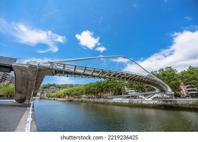 Bilbao, Spain. 08.07.2022. Zubizuri White Bridge Is A Bridge Over Nervión River Ría De Bilbao Designed By Santiago Calatrava And Was Opened In 1997