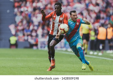 Bilbao, Spain. 14th April, 2019. Pais Vasco. San Mamés. Liga Santander. Athletic Bilbao V Rayo Vallecano: Iñaki Williams (#9) Fighting For The Ball With His Rival Tito (#2)