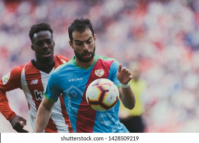 Bilbao, Spain. 14th April, 2019. Pais Vasco. San Mamés. Liga Santander. Athletic Bilbao V Rayo Vallecano: Jordi Amat (#16) Tries To Win The Ball Against Iñaki Williams (#9)