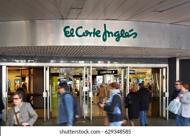 BILBAO, SPAIN - APRIL 25, 2017: El Corte Inglés Store With People Walking By The Main Entrance