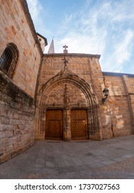 Bilbao, Spain - Feb 2020: Beautiful Wooden Door Entrance Way To Historic Building. Ornate Double Doors In Gothic Style. Stone Building Facade Exterior